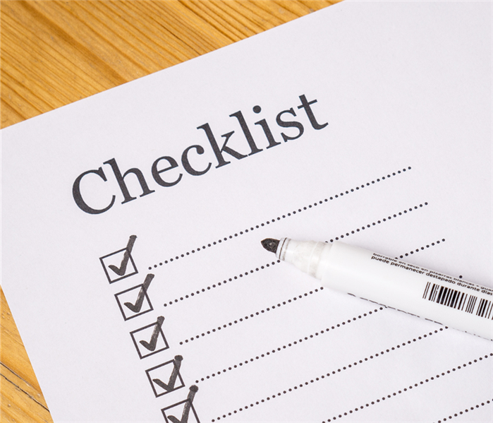 a checklist with a marker