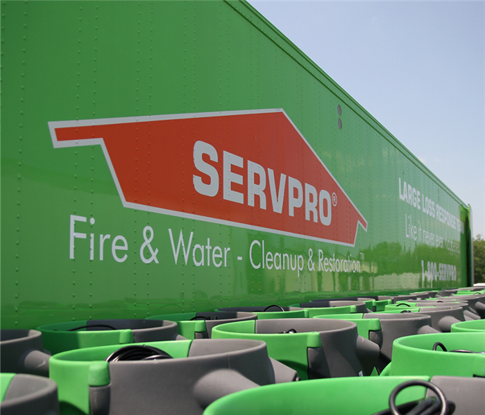 SERVPRO logo on a truck with equipment in front