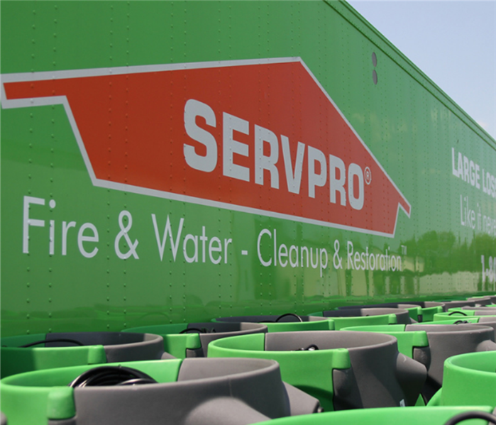 SERVPRO logo with equipment