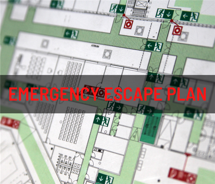 An emergency escape plan with the words 'Emergency Escape Plan' written over top of it